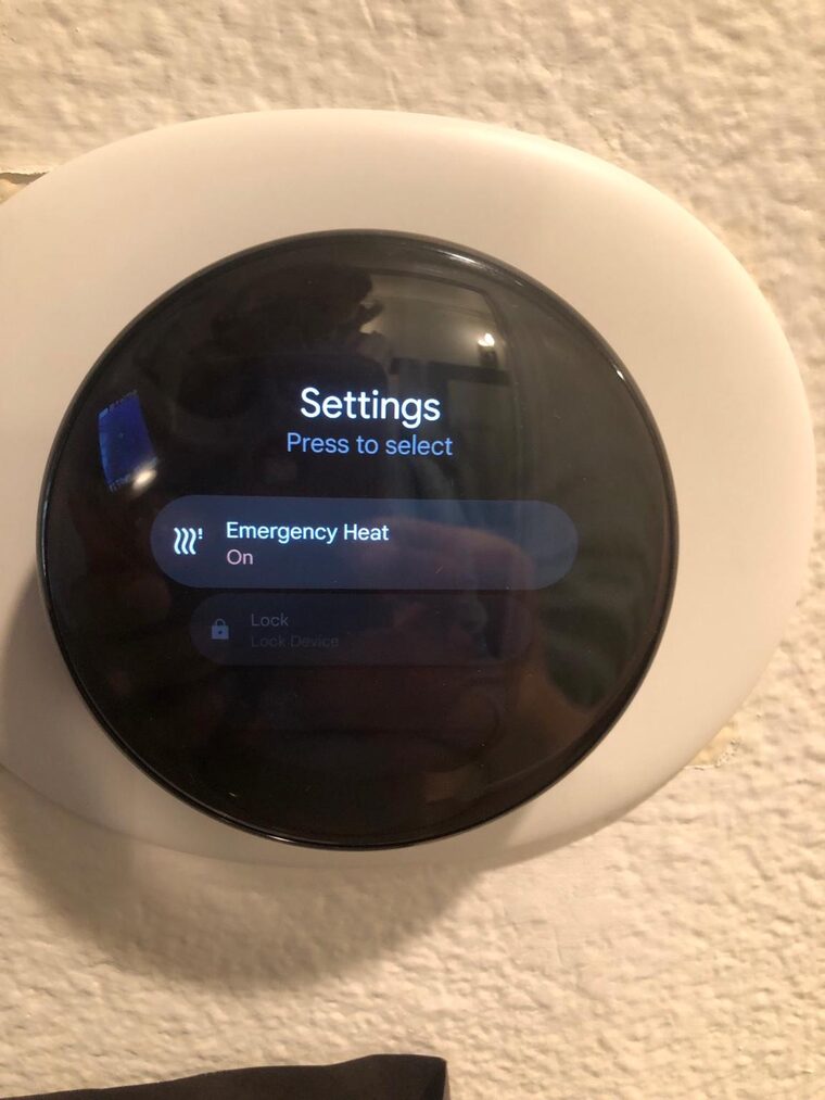 Nest thermostat Settings screen with the Emergency Heat option set to On