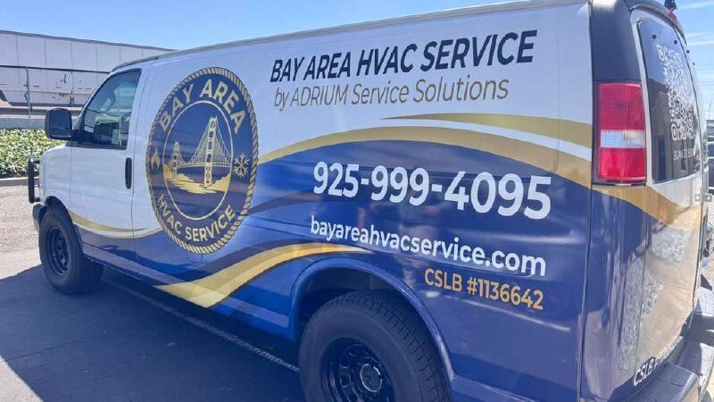 Rear-side close-up of the Bay Area HVAC Service van