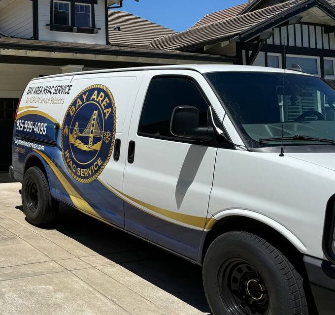 Side of the Bay Area HVAC Service van in a residential driveway