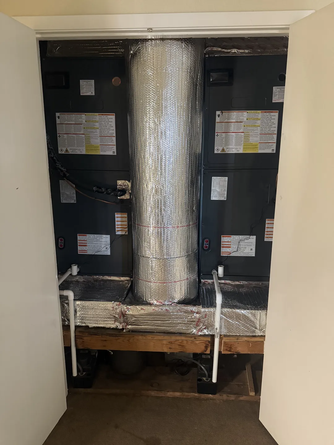 Newly installed dual Goodman air handlers after full system replacement, Morgan Hill