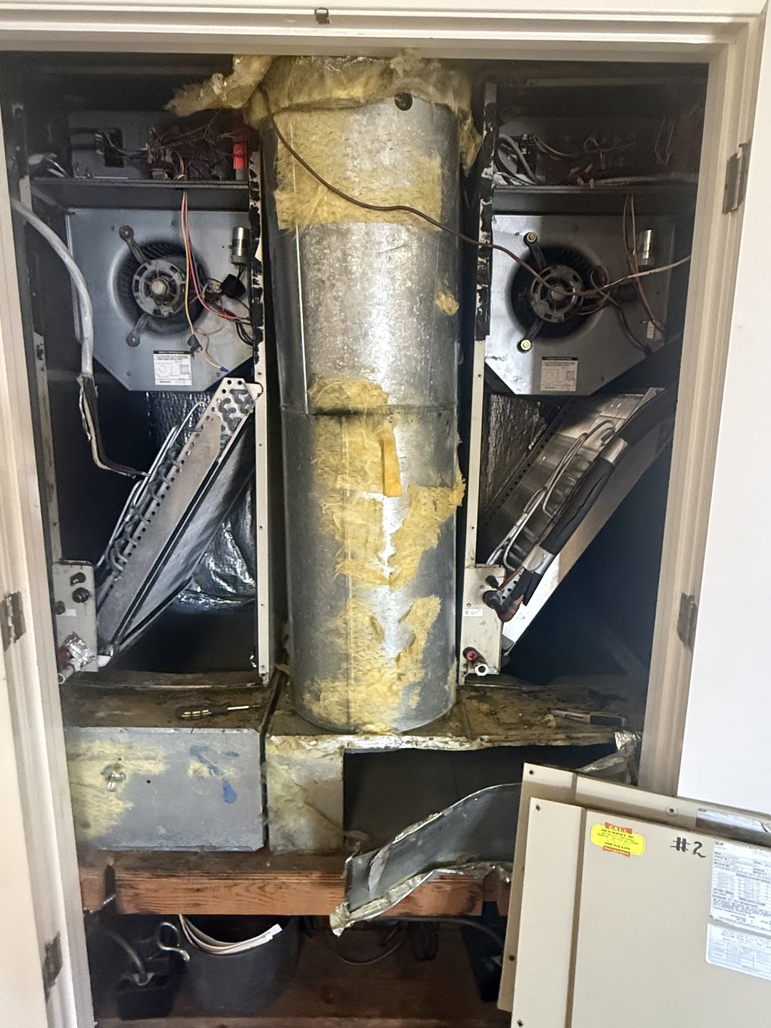 Existing air handler units before dual heat pump system replacement, Morgan Hill