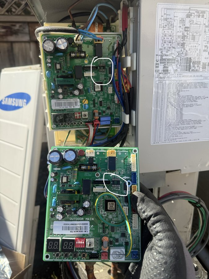 Two Samsung control boards compared during mini-split PCB swap, Pleasanton