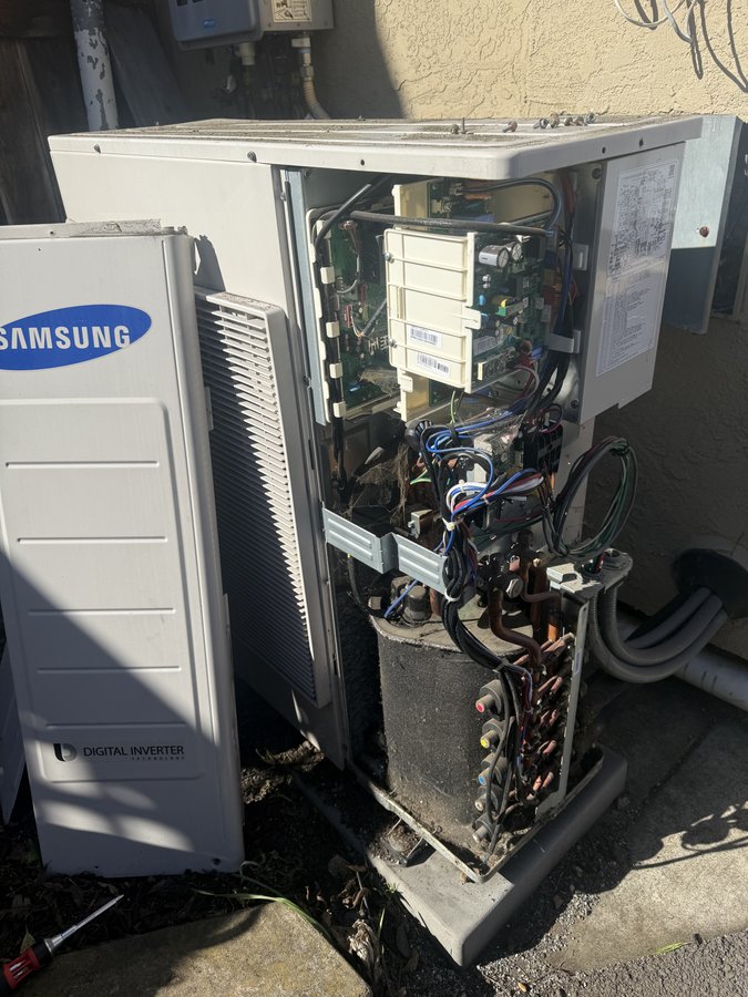 Samsung outdoor condenser opened with service panel removed during mini-split board work, Pleasanton