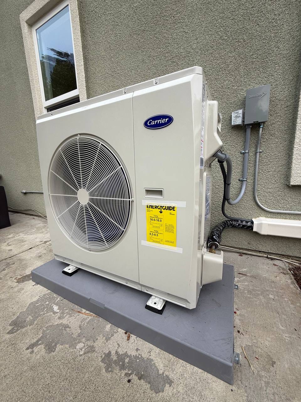 Carrier 19 SEER heat pump installation in progress — condenser install in San Ramon