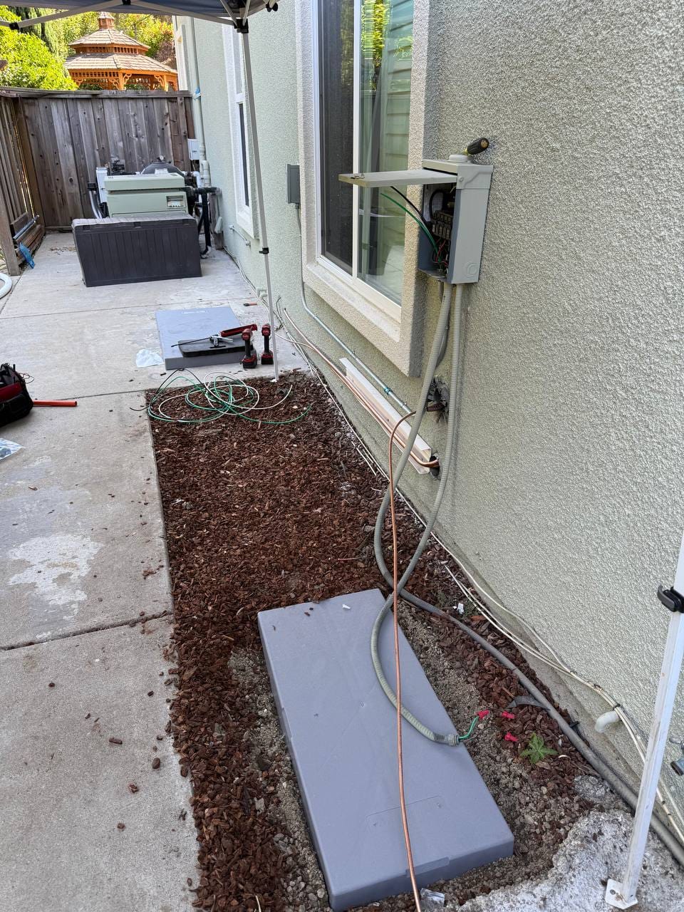Carrier 19 SEER heat pump installation in progress — refrigerant line installation in San Ramon
