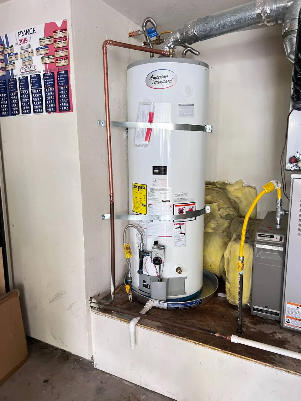 New American Standard 50-gallon gas water heater installed with seismic strapping and new gas shutoff, Danville