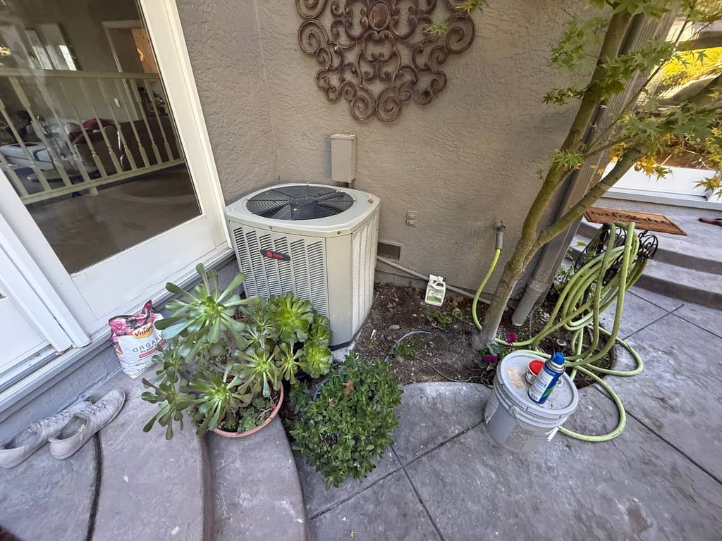 Old weathered AC condenser before Bryant heat pump replacement, Pleasanton