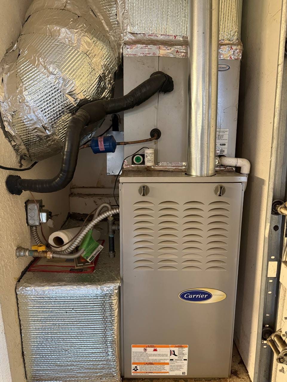 Carrier gas furnace cabinet closed up in closet, Pleasanton