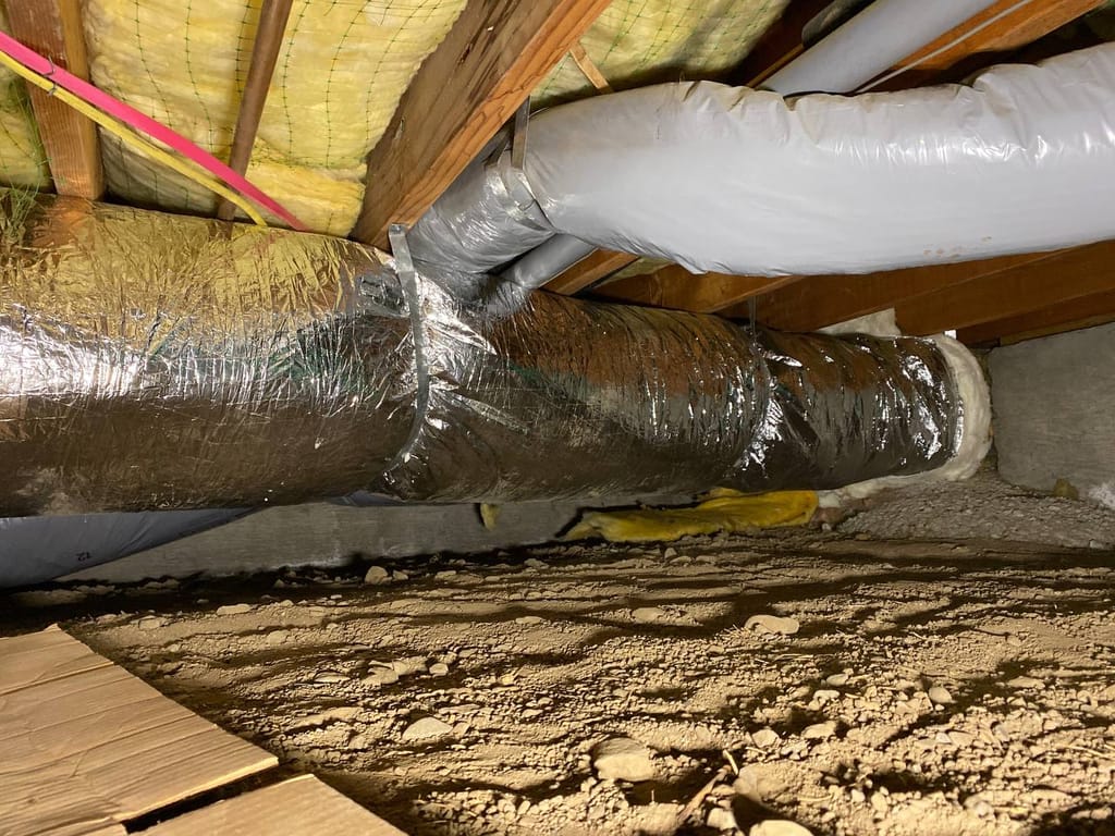 Sagging crawl-space duct runs before re-support, mixed old foil and grey flex, Walnut Creek