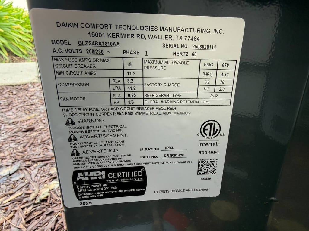 Nameplate of the new Goodman GLZS4BA1810AA 1.5-ton R-32 heat pump condenser, San Ramon