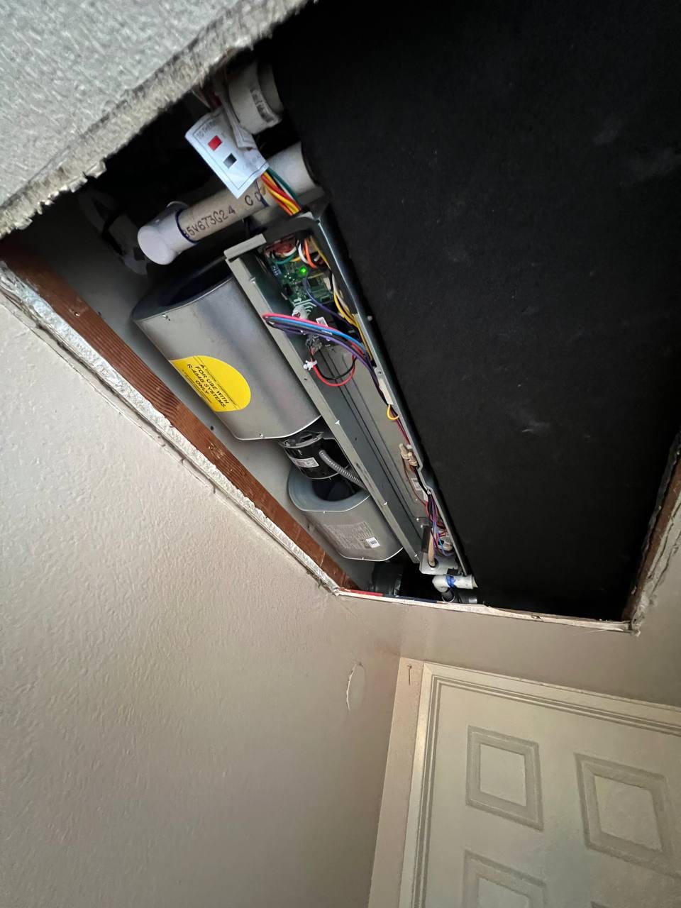 Indoor air handler control board and wiring exposed during install, San Ramon