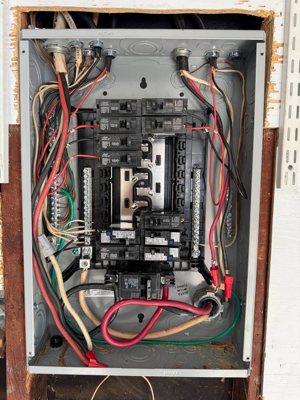 Electrical sub-panel wiring for the new heat pump circuit during installation, Martinez