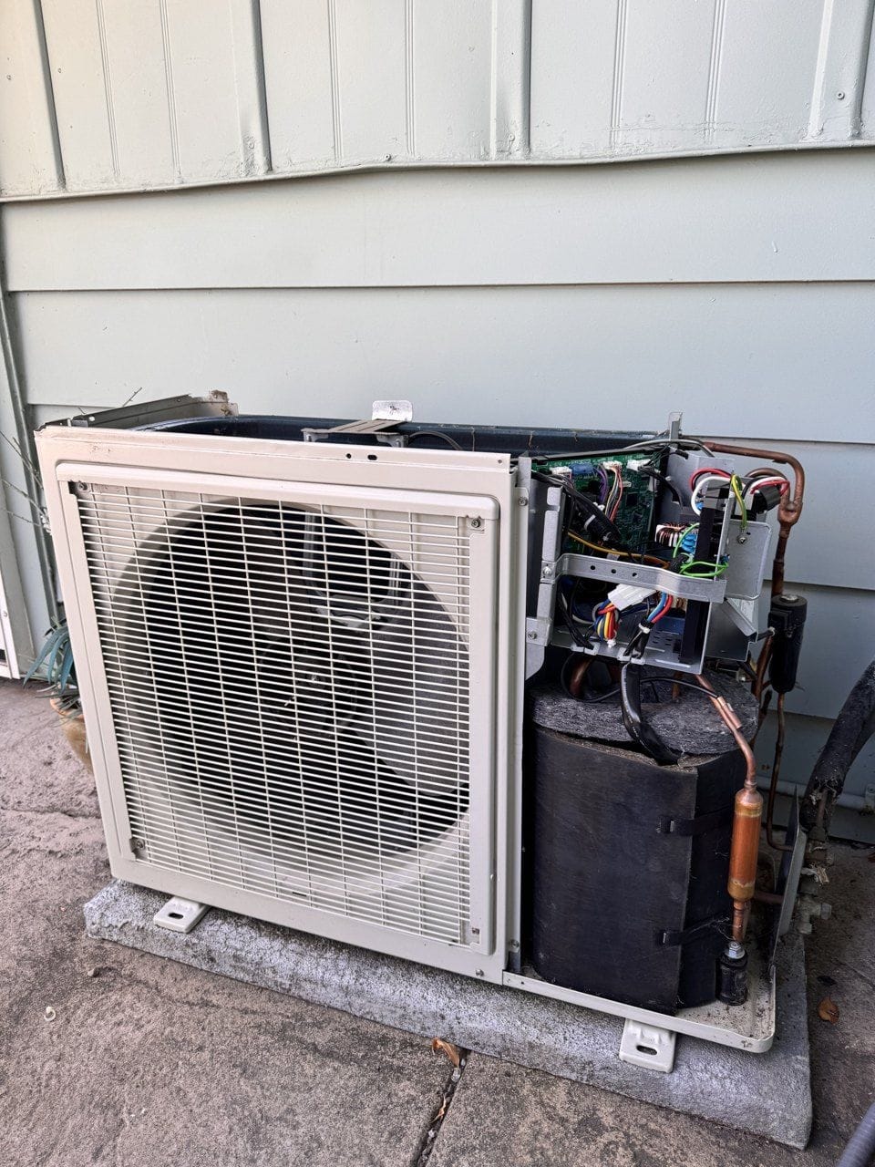 Electrical box of a Daikin outdoor unit in Concord, CA, with the control board wired in